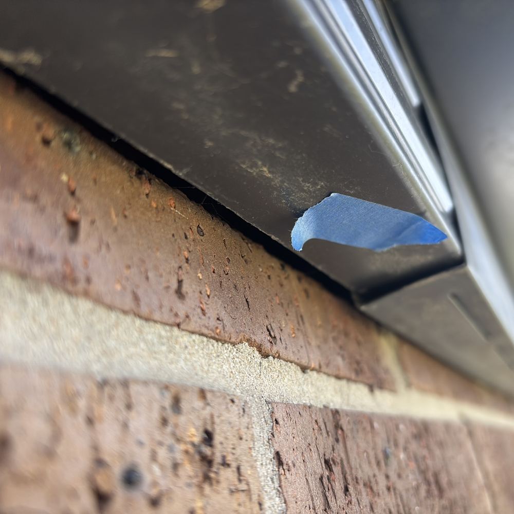 Open gaps in the brick veneer that let moisture into the wall cavity, found during a defect investigation in Winter Valley