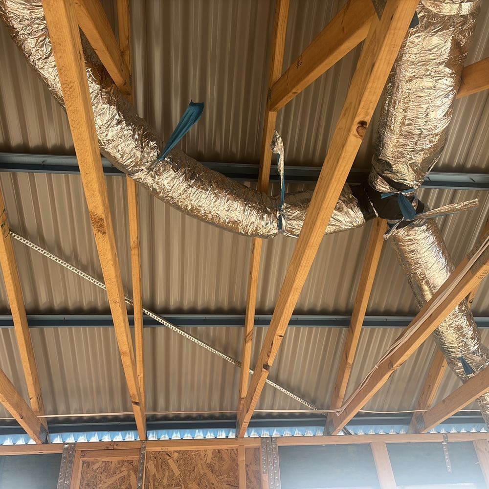 No sarking under the tiled roof, with the builder to confirm it, found during a lock-up inspection in Maddingley