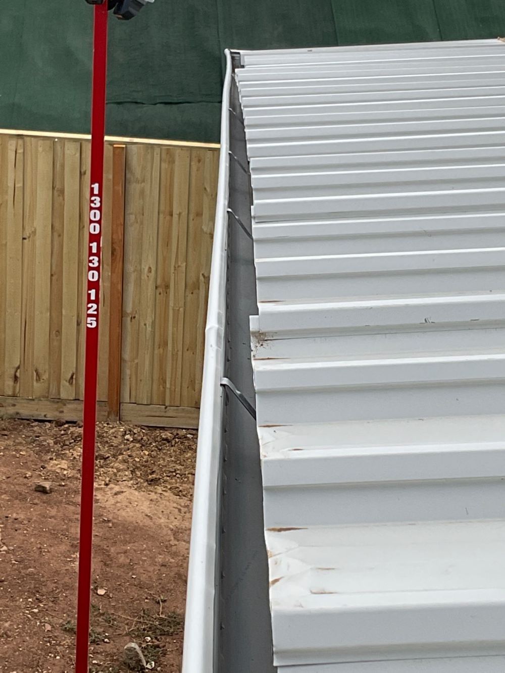 Roof sheets, downpipes and stormwater at handover