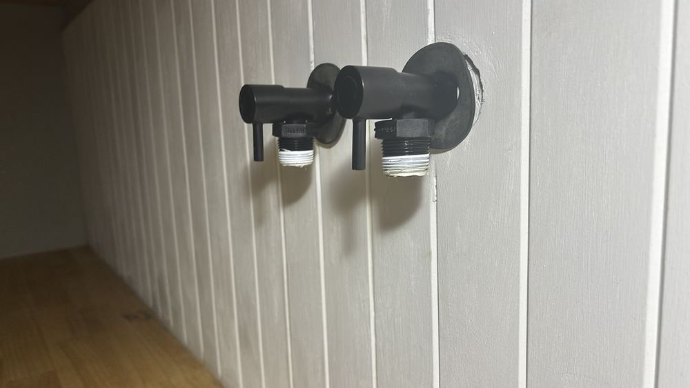 Kitchen mixer not secured to the bench, risking a leak below, Darley, Ballarat